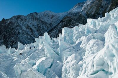 2 Day West Coast Glaciers and TranzAlpine Train: Queenstown to Christchurch - Franz Josef glacier shuttle to Glacier Valley: road-end viewing done right