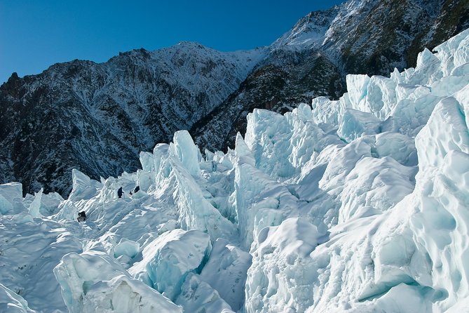 2 Day West Coast Glaciers and TranzAlpine Train: Queenstown to Christchurch - Franz Josef glacier shuttle to Glacier Valley: road-end viewing done right