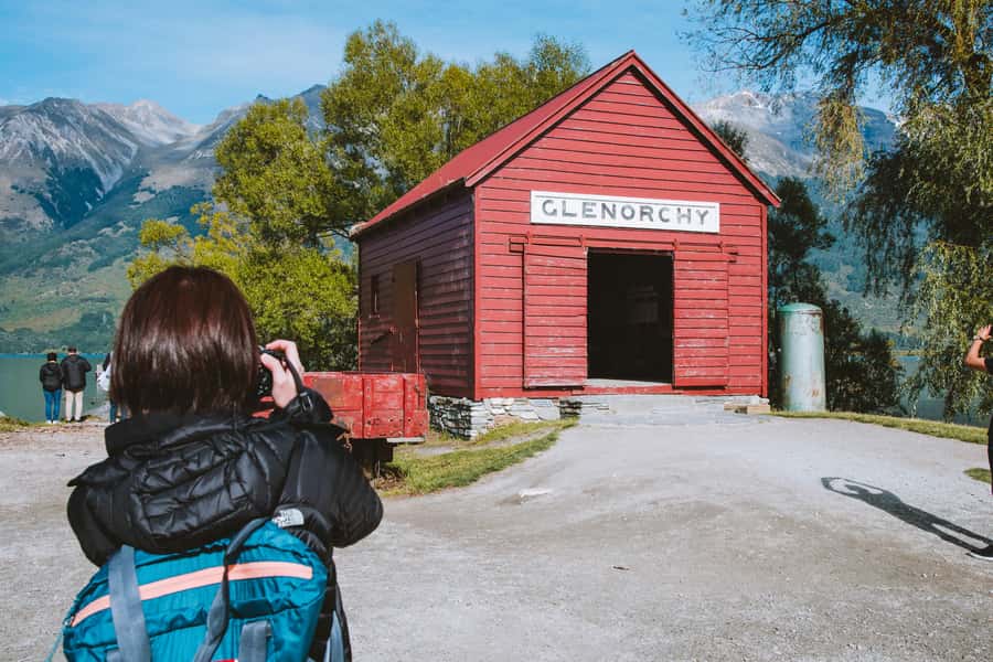 From Queenstown: Glenorchy and Paradise Scenic Half-Day Tour - Glenorchy town time: red shed vibes and Māori stories