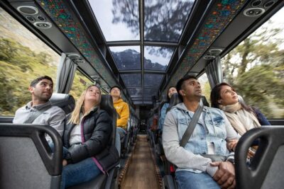 Milford Sound Day Tour from Queenstown - Queenstown pickup and the road ride in a glass-roof coach
