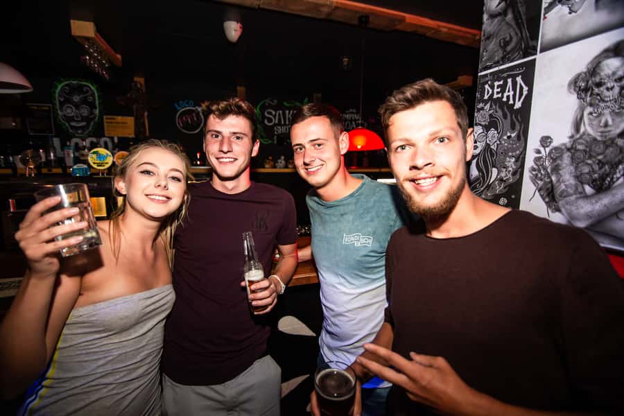 Queenstown: Bar Crawl with 5 Free Shots and Pizza - Queenstown at 9 PM: The London Bar Sets the Tone