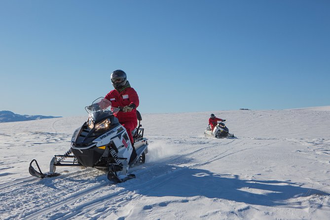 Queenstown Heli-Snowmobiling Adventure - Small groups (up to six): safer, easier, and more personal