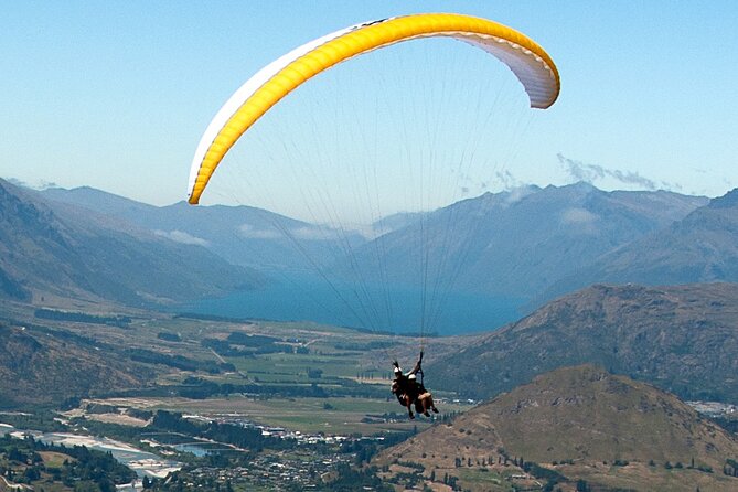 Queenstown Tandem Paragliding from Coronet Peak - Landing and getting back: gentle touchdown, quick wrap-up